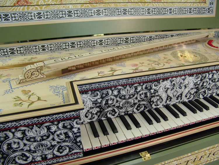 Here the Caligrapher is hand lettering with india ink - Tomlinson Harpsichords