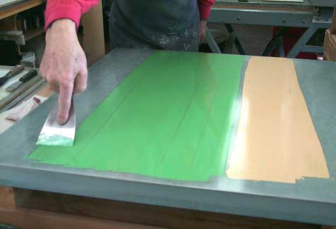 Green and ochre ink is applied side by side on the inking slab - Cariboo Stone Press